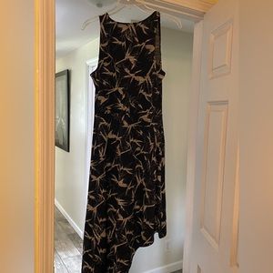 This maxi dress is very dressy. Worn once on honey moon